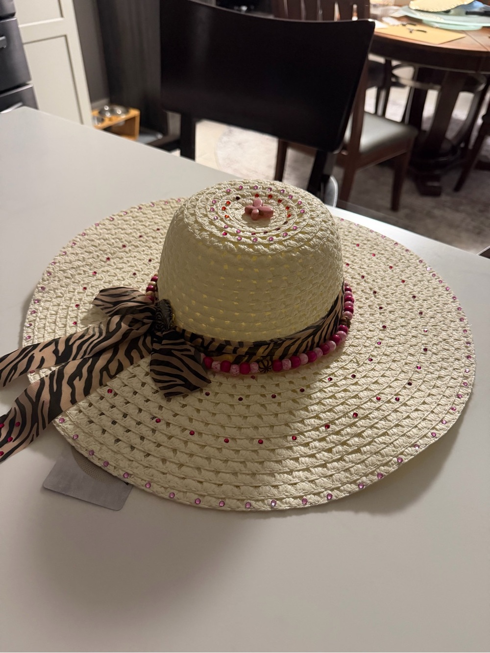Straw Sun Hat with Pink Bead Trim and Zebra Tie